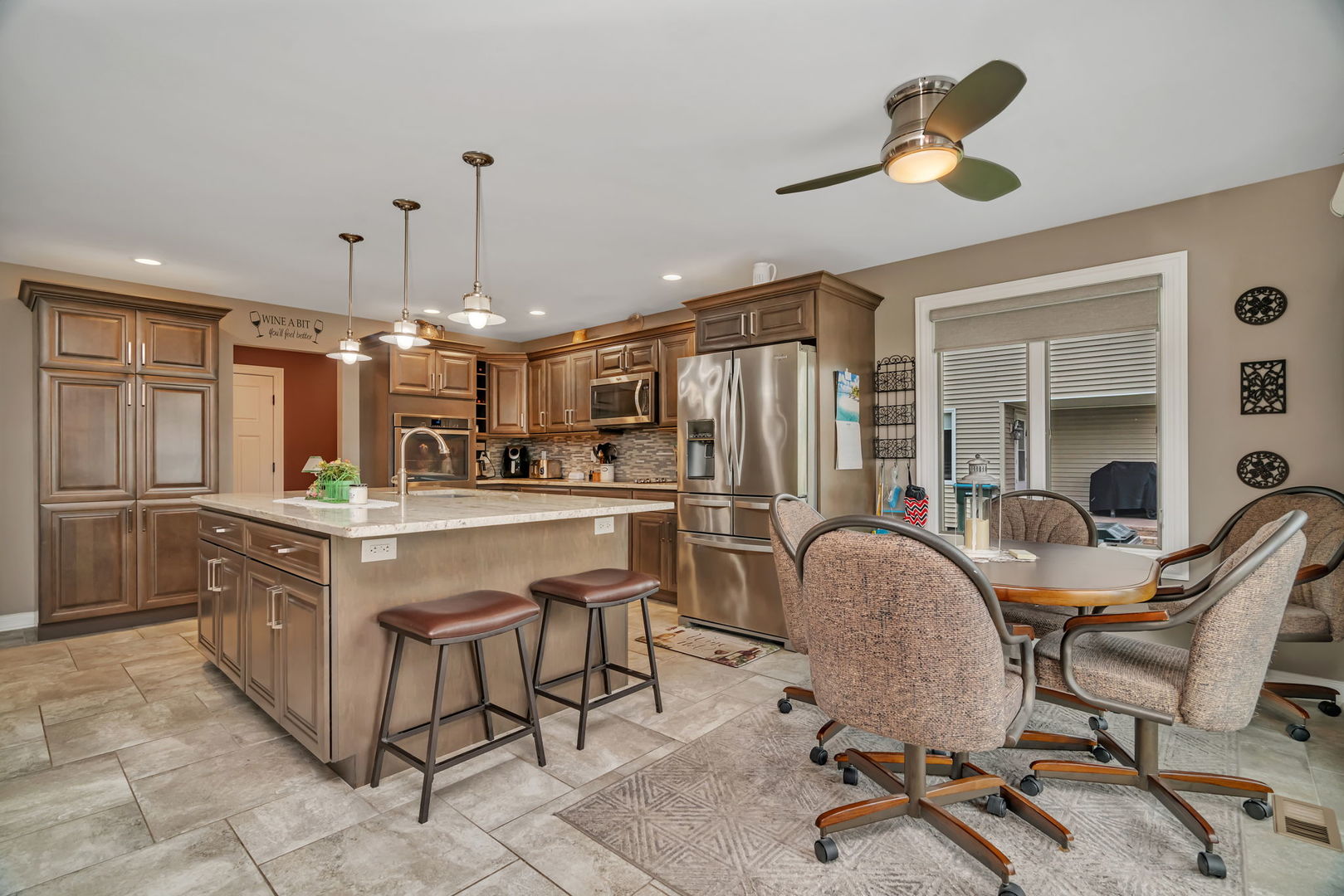 80 East Spring Road Coal City, IL 60416 - Photo 11 of 38 a kitchen with stainless steel appliances granite countertop a sink a stove and a refrigerator