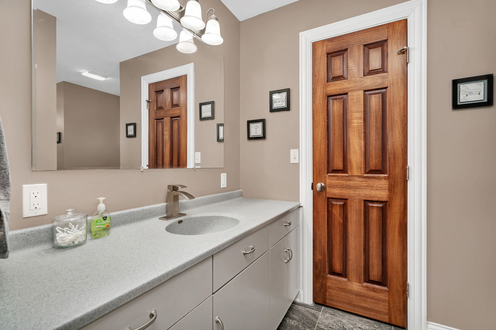 80 East Spring Road Coal City, IL 60416 - Photo 18 of 38 a bathroom with a sink a vanity and a mirror