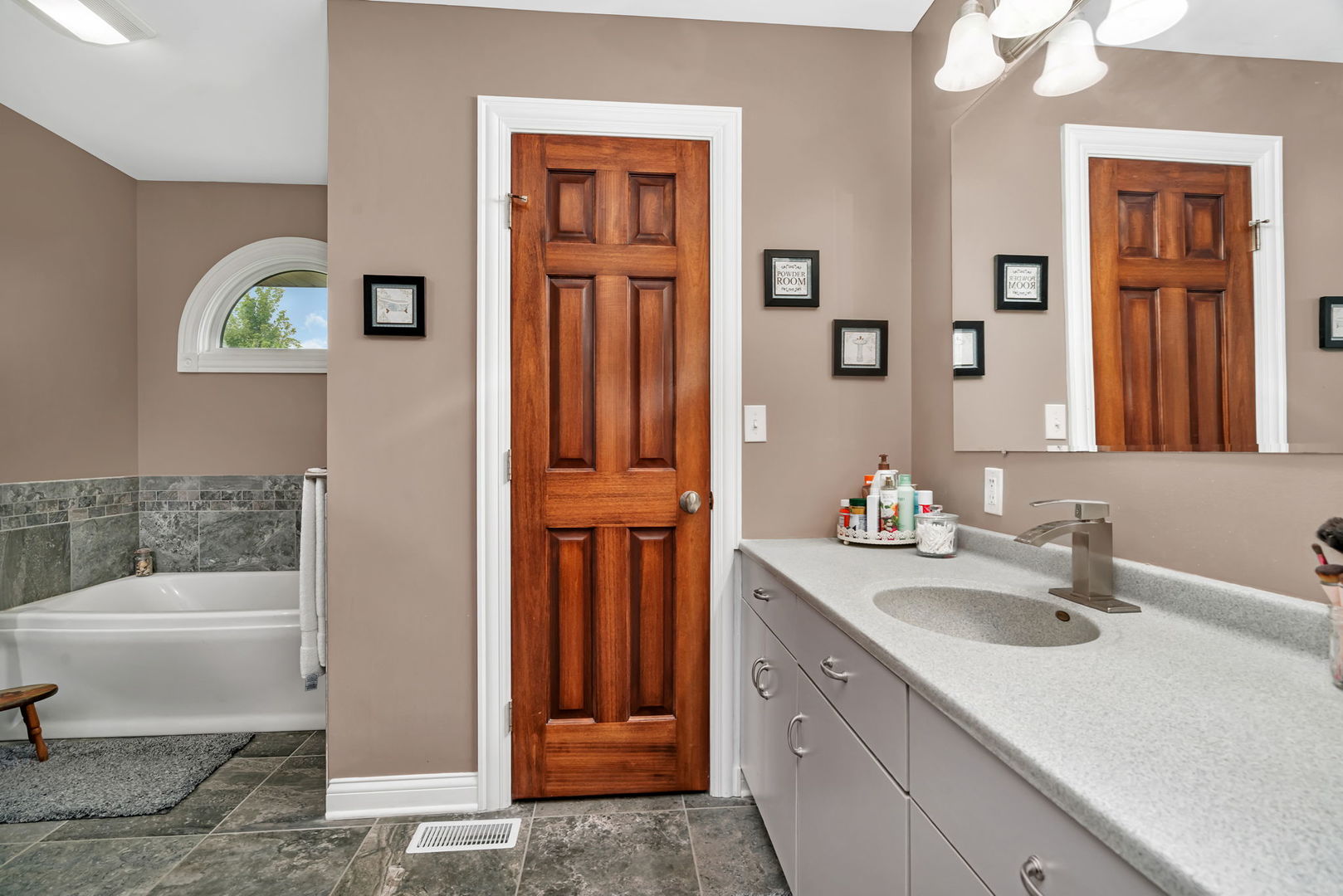 80 East Spring Road Coal City, IL 60416 - Photo 22 of 38 a bathroom with a sink a toilet and shower