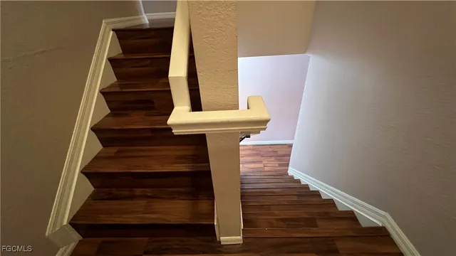 a view of entryway with wooden floor