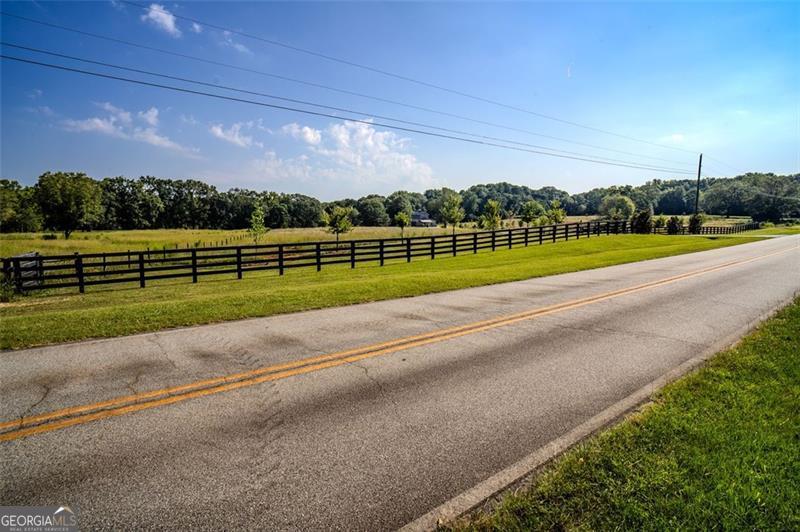 1700 Beaverdam Road Madison, GA 30650 - Photo 33 of 50 a view of road with a yard
