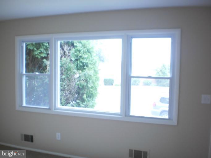9027 Samoset Road Randallstown, MD 21133 - Photo 23 of 23 a view of an empty room with a window
