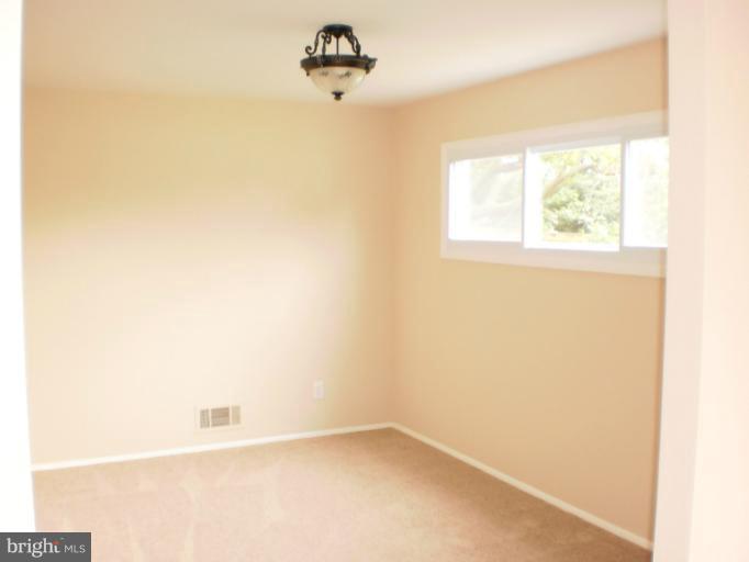9027 Samoset Road Randallstown, MD 21133 - Photo 4 of 23 a view of a small space with a window