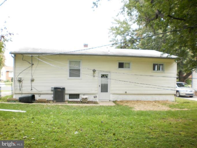 9027 Samoset Road Randallstown, MD 21133 - Photo 6 of 23 a view of a house with a backyard