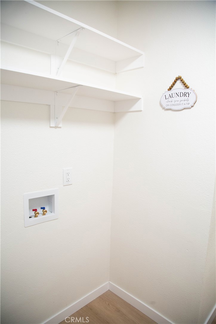 201 East Arrow Highway, Unit 73 Glendora, CA 91740 - Photo 20 of 43 a view of small space with racks on the wall