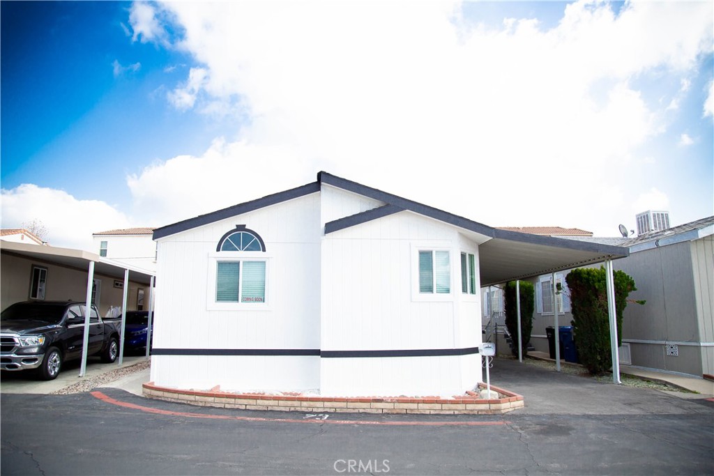 201 East Arrow Highway, Unit 73 Glendora, CA 91740 - Photo 25 of 43 a view of house and car parked in front of house