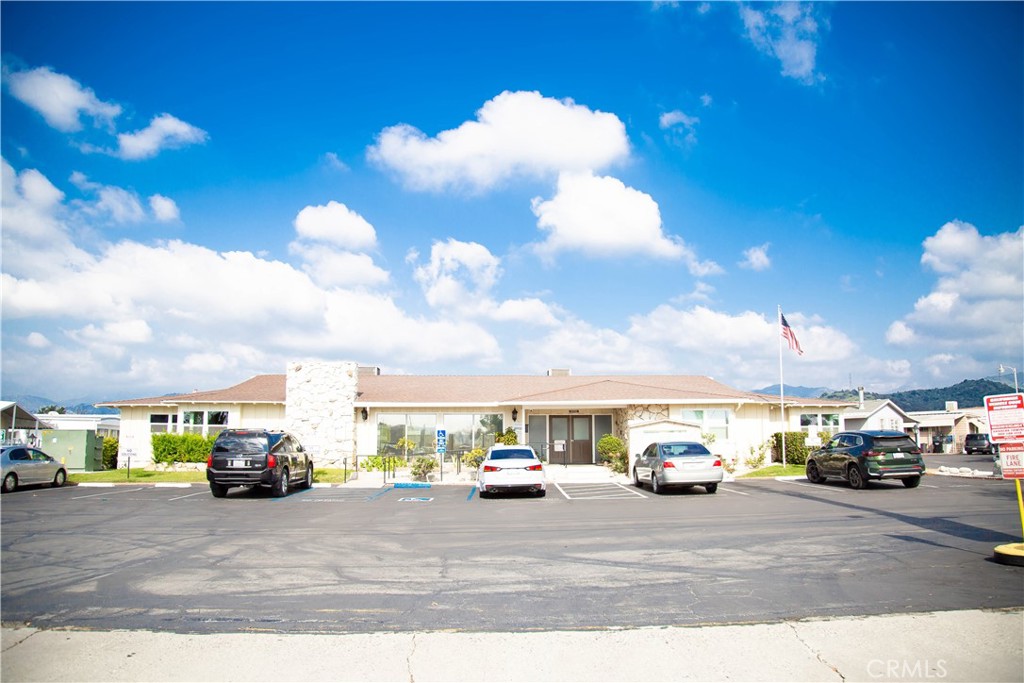 201 East Arrow Highway, Unit 73 Glendora, CA 91740 - Photo 28 of 43 a view of street with parked cars