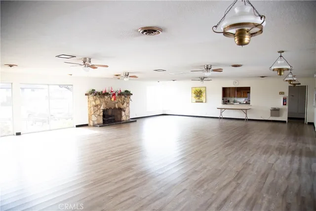 a kitchen with stainless steel appliances granite countertop a stove and a refrigerator