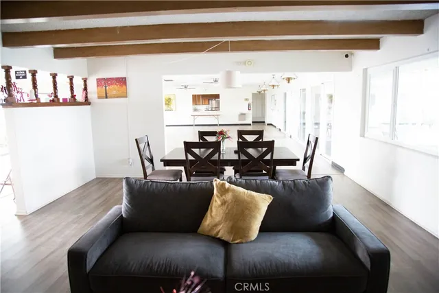 a room with toys and a wooden floor