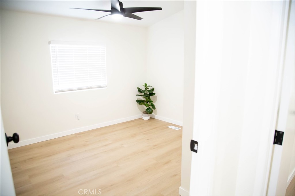 201 East Arrow Highway, Unit 73 Glendora, CA 91740 - Photo 10 of 43 a view of a white wall with a window