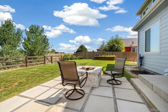 a view of a chair and table on the terrace
