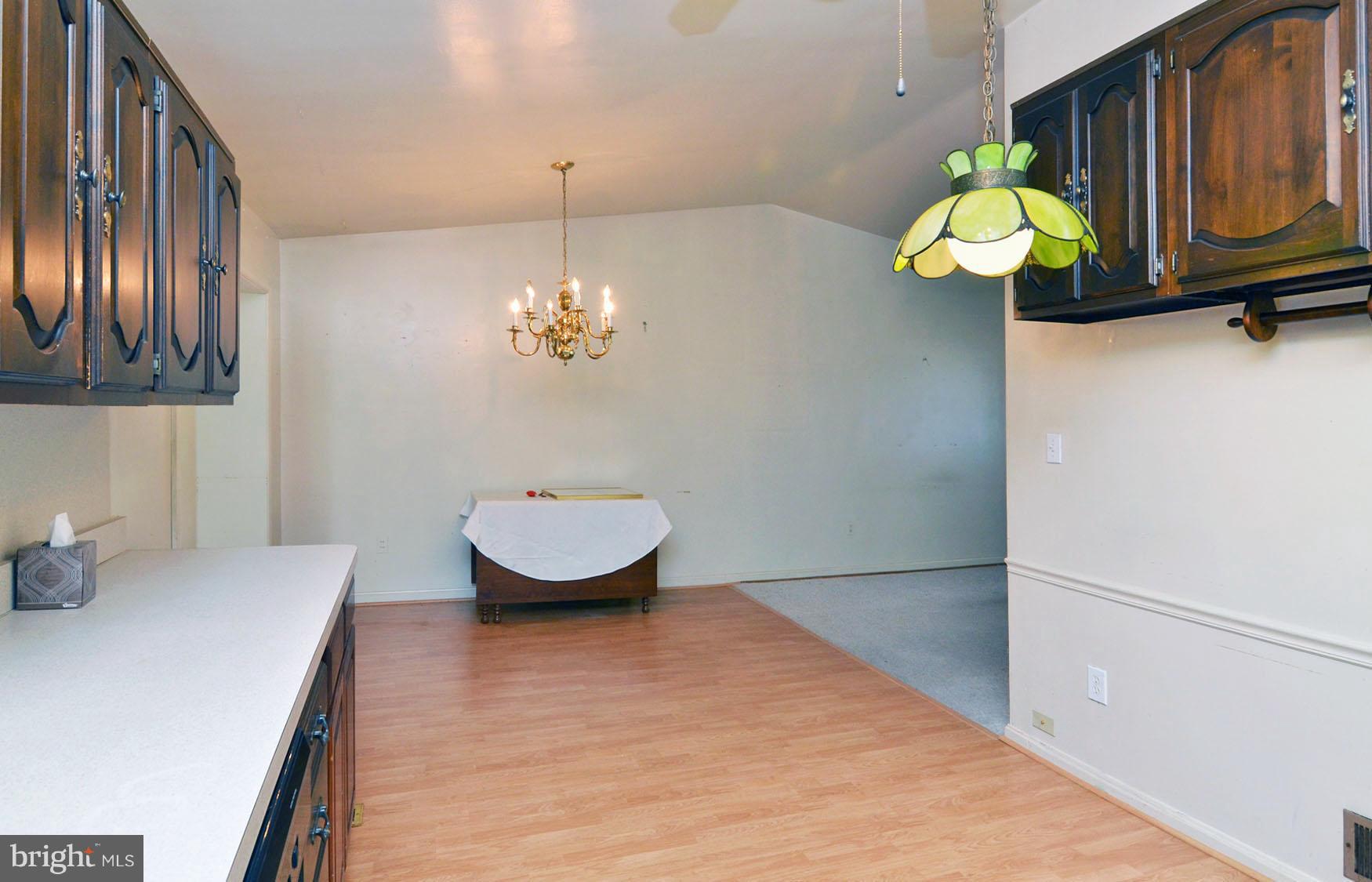 10909 Breewood Court Silver Spring, MD 20901 - Photo 6 of 19 Good size eating area in kitch w/cathedral ceiling