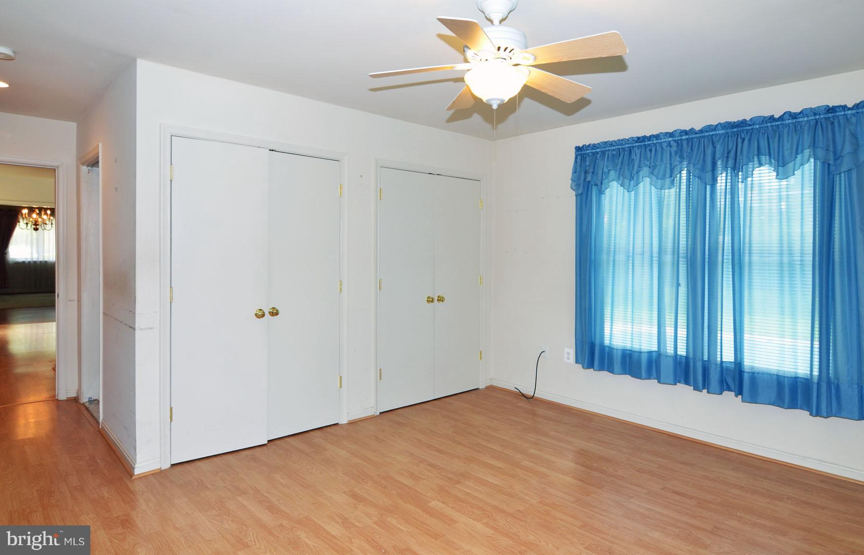 10909 Breewood Court Silver Spring, MD 20901 - Photo 8 of 19 Large bedroom in main level addition w/ceil fan.