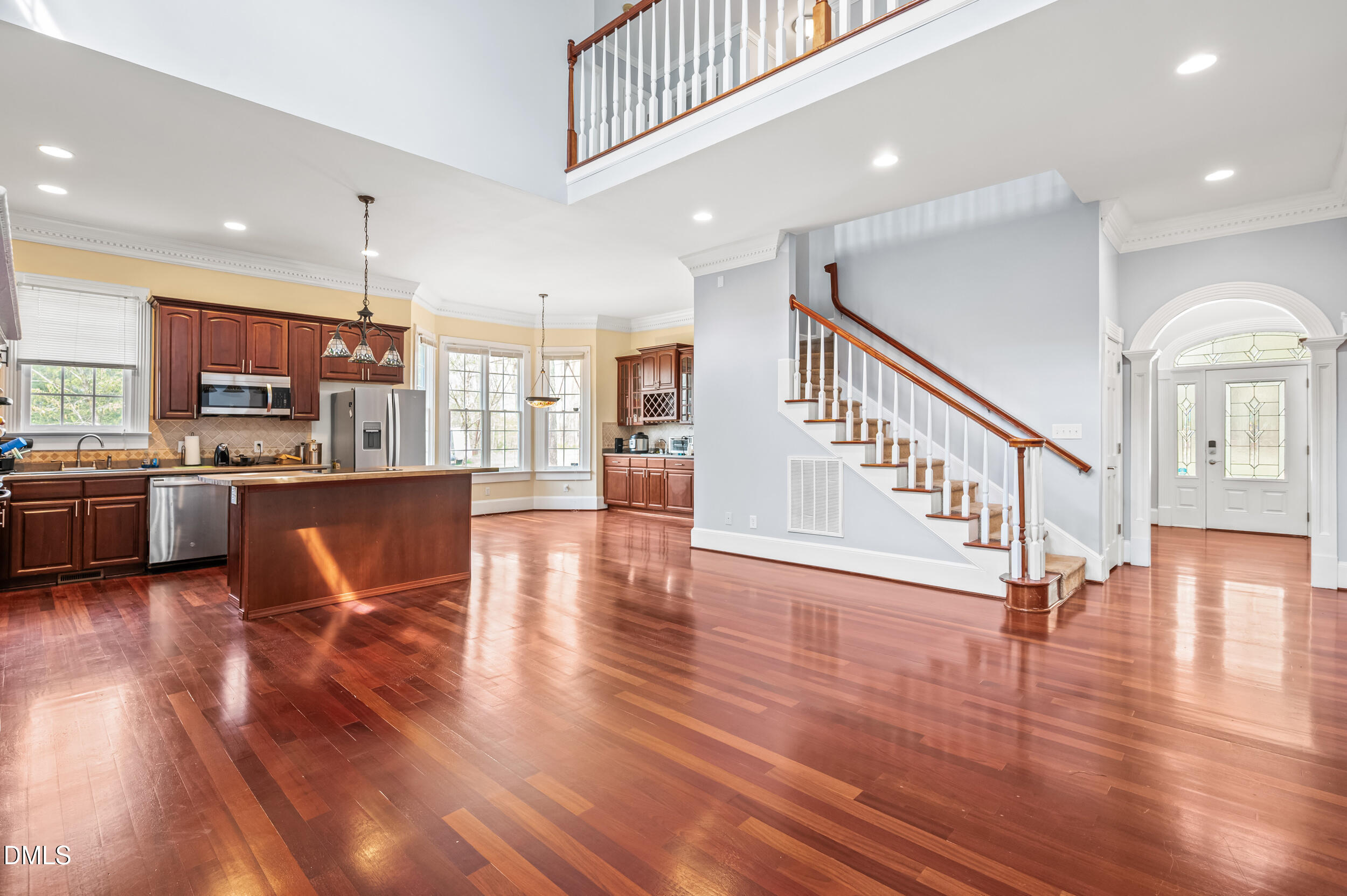 1957 Hilltop Road Raleigh, NC 27610 - Photo 11 of 46 a view of kitchen with cabinets and wooden floor