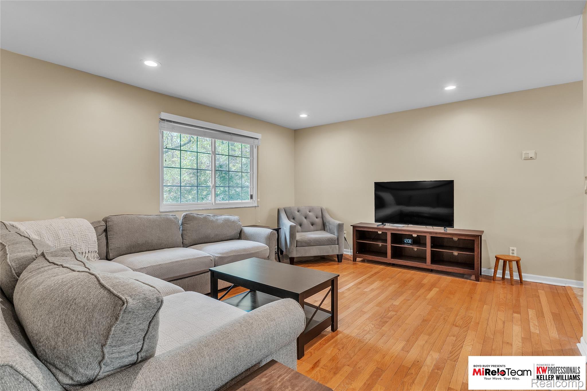 10191 Judd Road Willis, MI 48191 - Photo 4 of 39 Living room with light wood-type flooring and recessed lighting