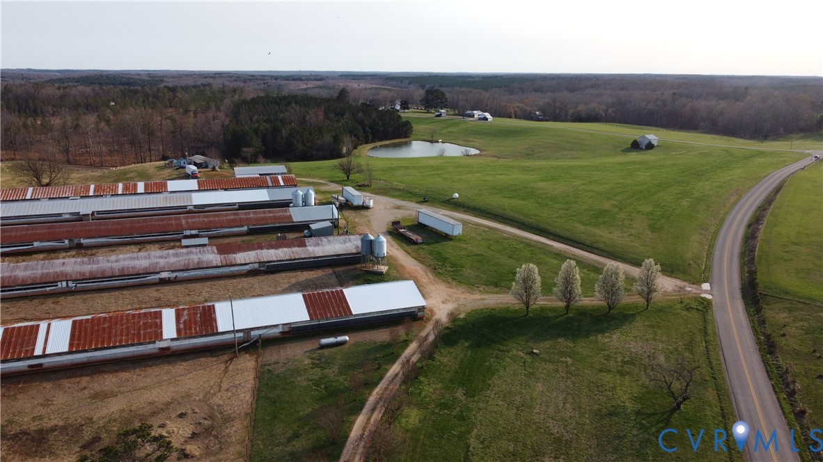 23381 Genito Road Jetersville, VA 23083 - Photo 32 of 54 Bird's eye view of a heavily wooded area and a lar