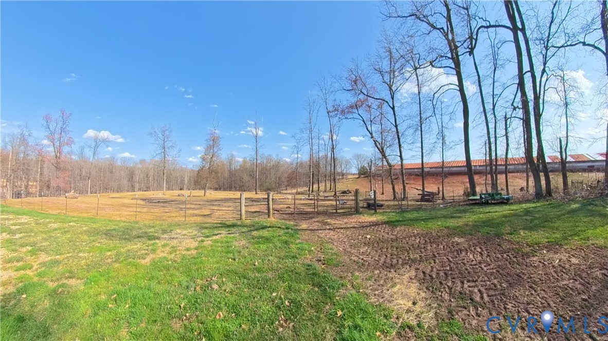 23381 Genito Road Jetersville, VA 23083 - Photo 39 of 54 a view of a yard with swimming pool and trees