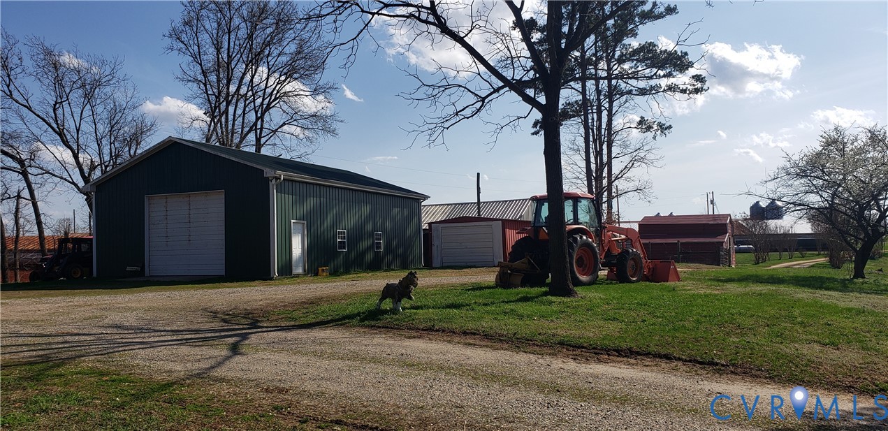 23381 Genito Road Jetersville, VA 23083 - Photo 4 of 29 a front view of house with yard and green space