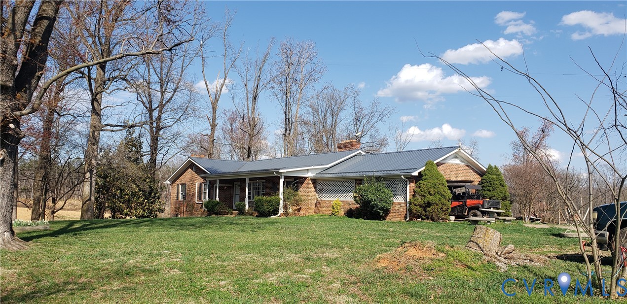 23381 Genito Road Jetersville, VA 23083 - Photo 54 of 54 a front view of a house with a yard and trees