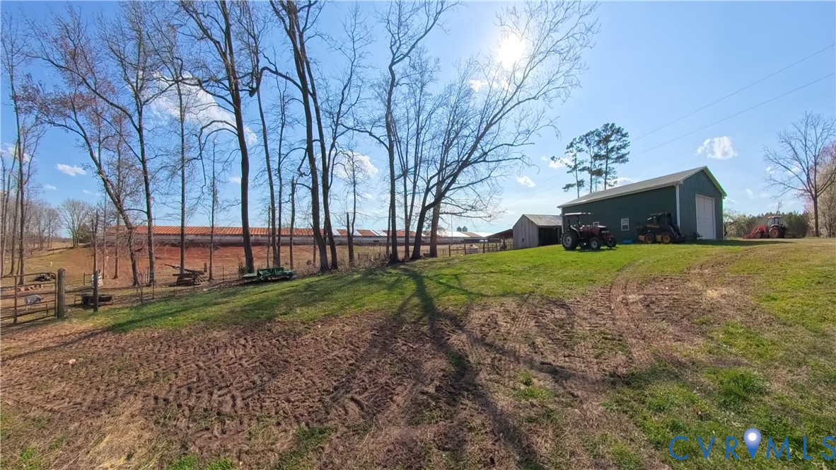 23381 Genito Road Jetersville, VA 23083 - Photo 7 of 29 View of yard with an outdoor structure, a view of