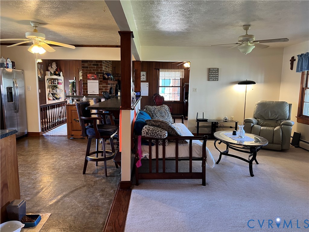 23381 Genito Road Jetersville, VA 23083 - Photo 8 of 54 a living room with furniture and a window