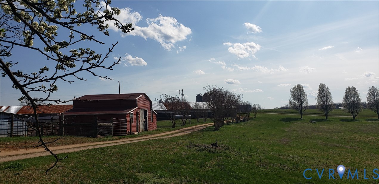 23381 Genito Road Jetersville, VA 23083 - Photo 9 of 29 a view of a house with a backyard