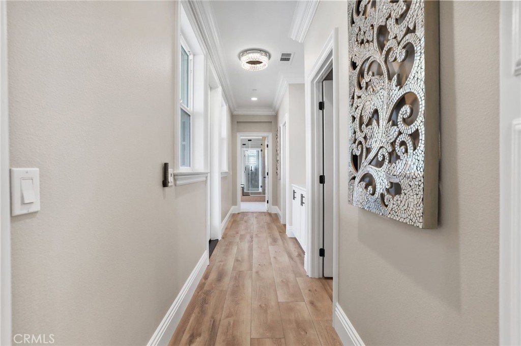 13430 Pointer Court Riverside, CA 92503 - Photo 36 of 55 a view of a hallway with wooden floor and closet