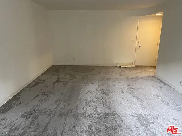 a view of a room with an empty space