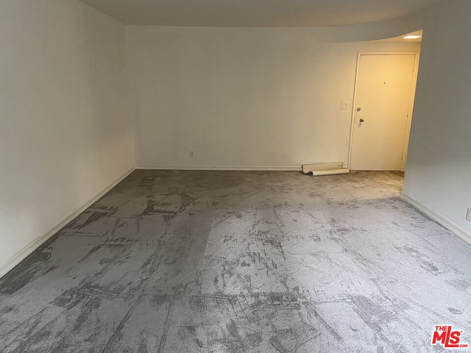 10655 Wilshire Boulevard, Unit 303 Los Angeles, CA 90024 - Photo 6 of 27 a view of a room with an empty space