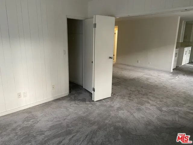 an empty room with a door