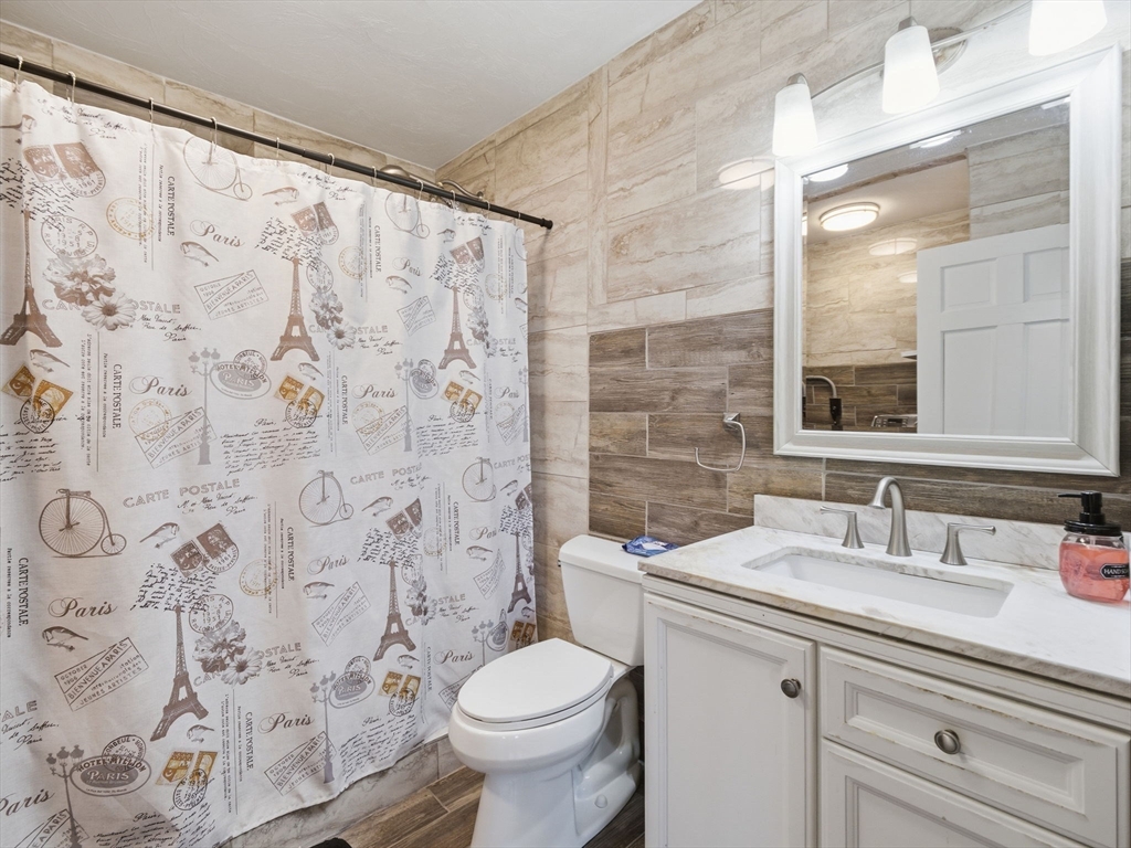 39 Swan Avenue Methuen, MA 01844 - Photo 36 of 42 a bathroom with a sink toilet and shower