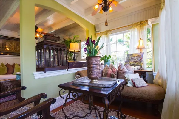 a kitchen that has a lot of fruit on it and cabinets