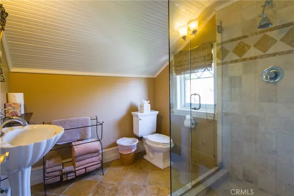 a room with sink and window