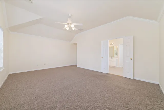 an empty room with a bathroom