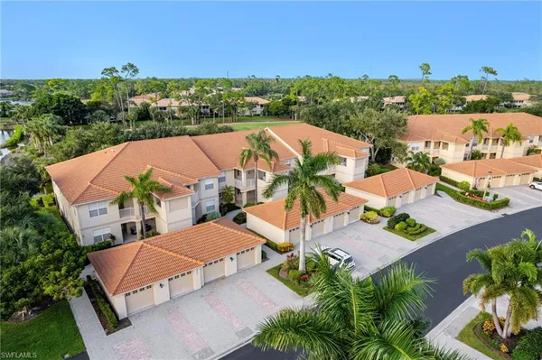 an aerial view of residential houses and outdoor space