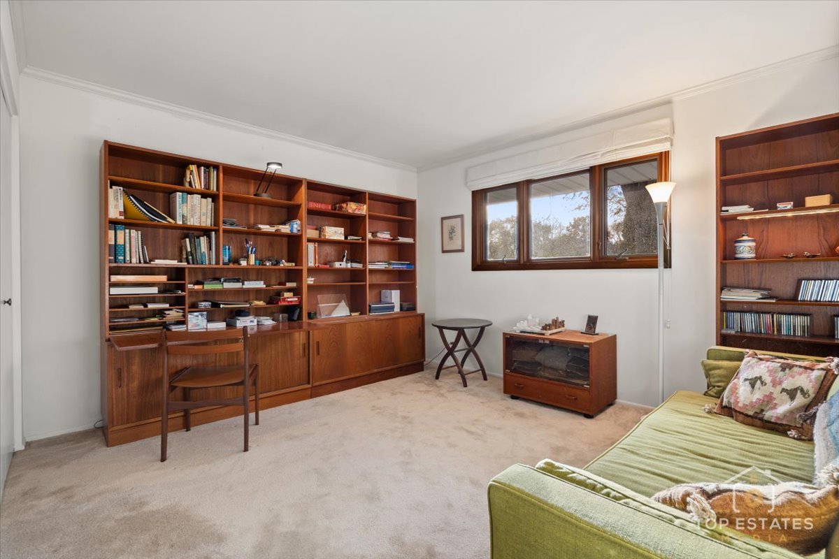 1802 Aspen Drive Mount Prospect, IL 60056 - Photo 20 of 30 a bedroom with a bed and furniture