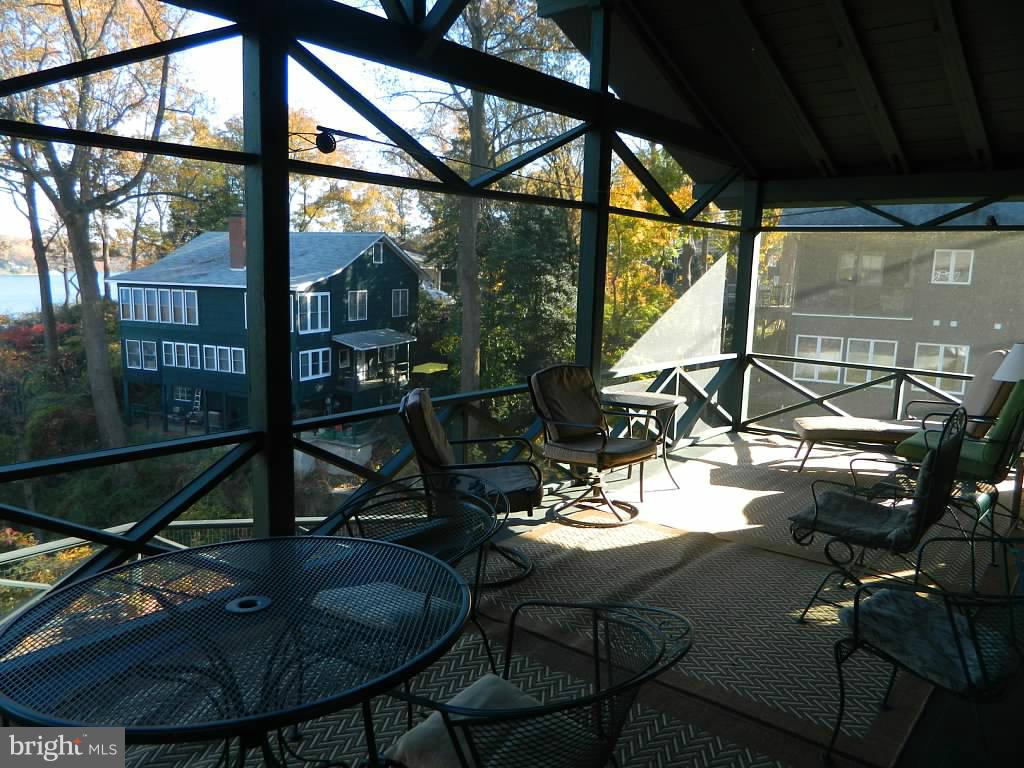 332 Thorsby Road Annapolis, MD 21405 - Photo 15 of 30 a view of a chairs and table in patio