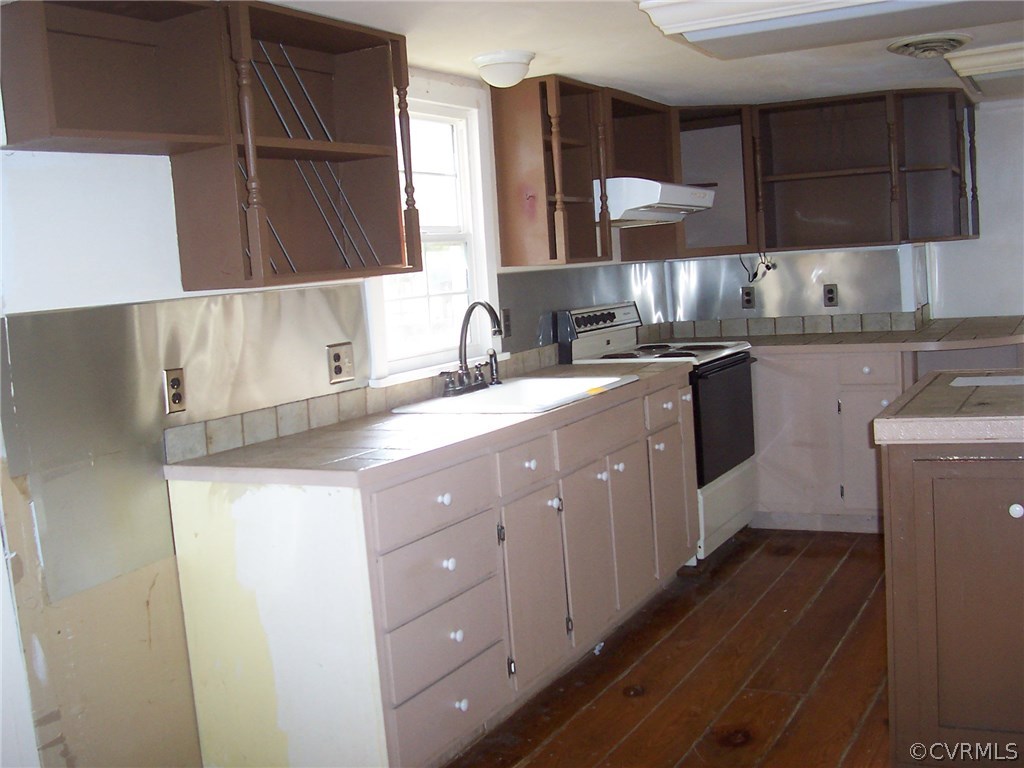 95 Whites Neck Road Cardinal, VA 23025 - Photo 7 of 14 a kitchen with a sink cabinets and appliances