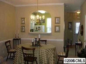 754 Shellstone Place Fort Mill, SC 29708 - Photo 4 of 8 a view of a dining room with furniture and chandelier