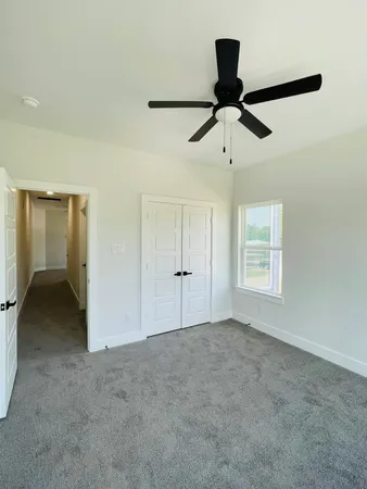 a bathroom with a sink a toilet and bathtub