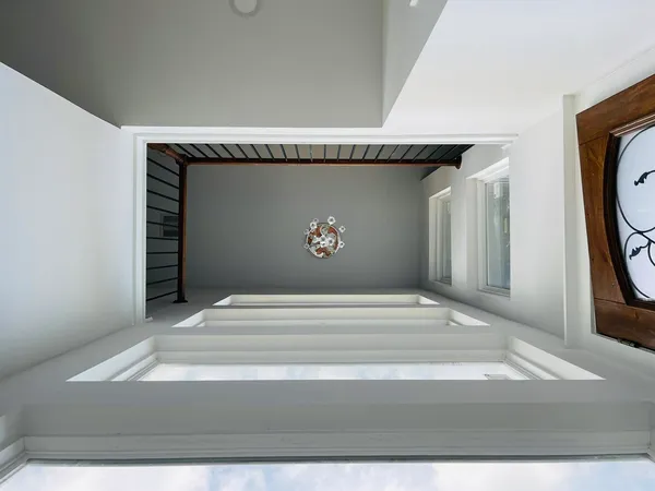 a kitchen with stainless steel appliances granite countertop a refrigerator sink and stove