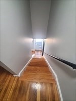 174 Pine Street, Unit 23 Holbrook, MA 02343 - Photo 16 of 25 a view of a room with wooden floor