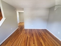 174 Pine Street, Unit 23 Holbrook, MA 02343 - Photo 7 of 25 a view of wooden floor in a room