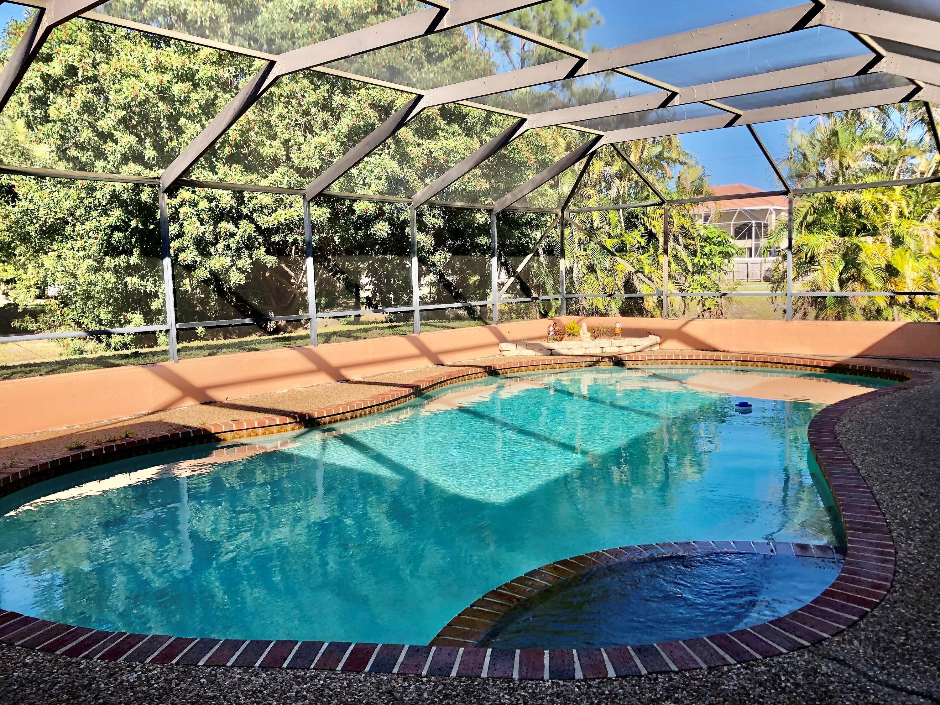 4535 Baldric Street Boca Raton, FL 33428 - Photo 15 of 19 a view of a backyard of a house