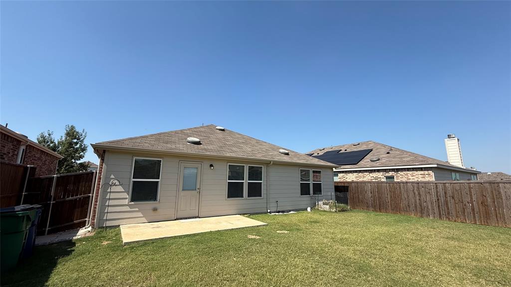 3312 Biggs Avenue Aubrey, TX 76227 - Photo 18 of 19 a front view of a house with a yard