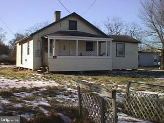 11328 Greenwood Road Princess Anne, MD 21853 - Photo 1 of 1 a front view of a house with a yard