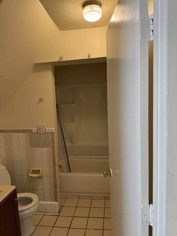 31 Moreland Street, Unit 2 Boston, MA 02119 - Photo 9 of 9 a bathroom with a shower and toilet