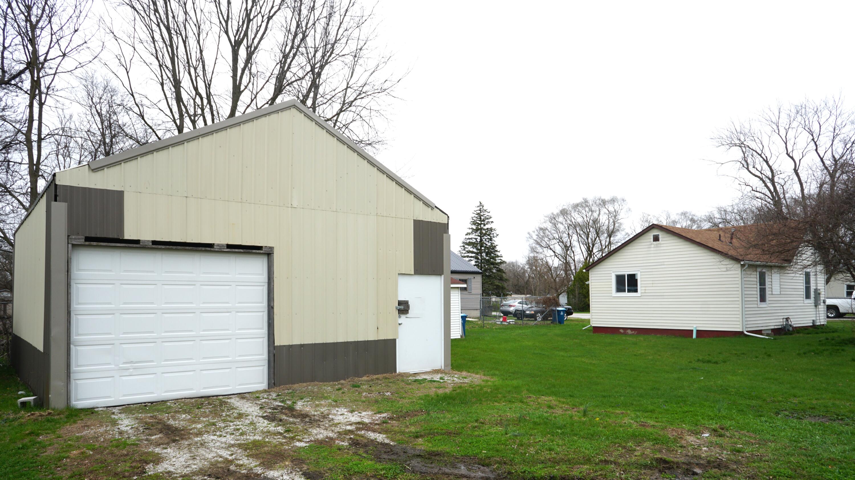 307 South East Street Knox, IN 46534 - Photo 15 of 15 a view of a house with a yard