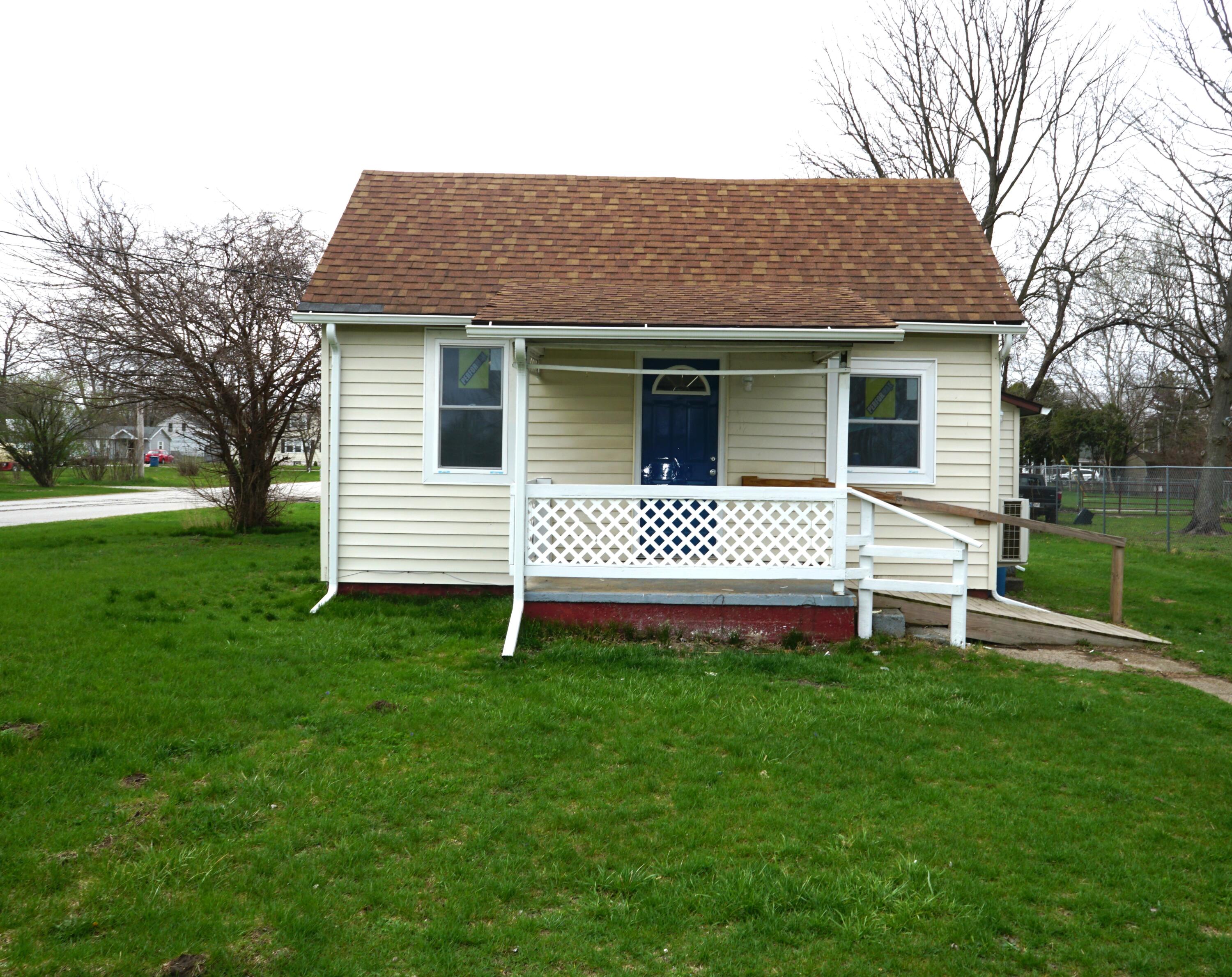 307 South East Street Knox, IN 46534 - Photo 2 of 15 a view of a house with a yard