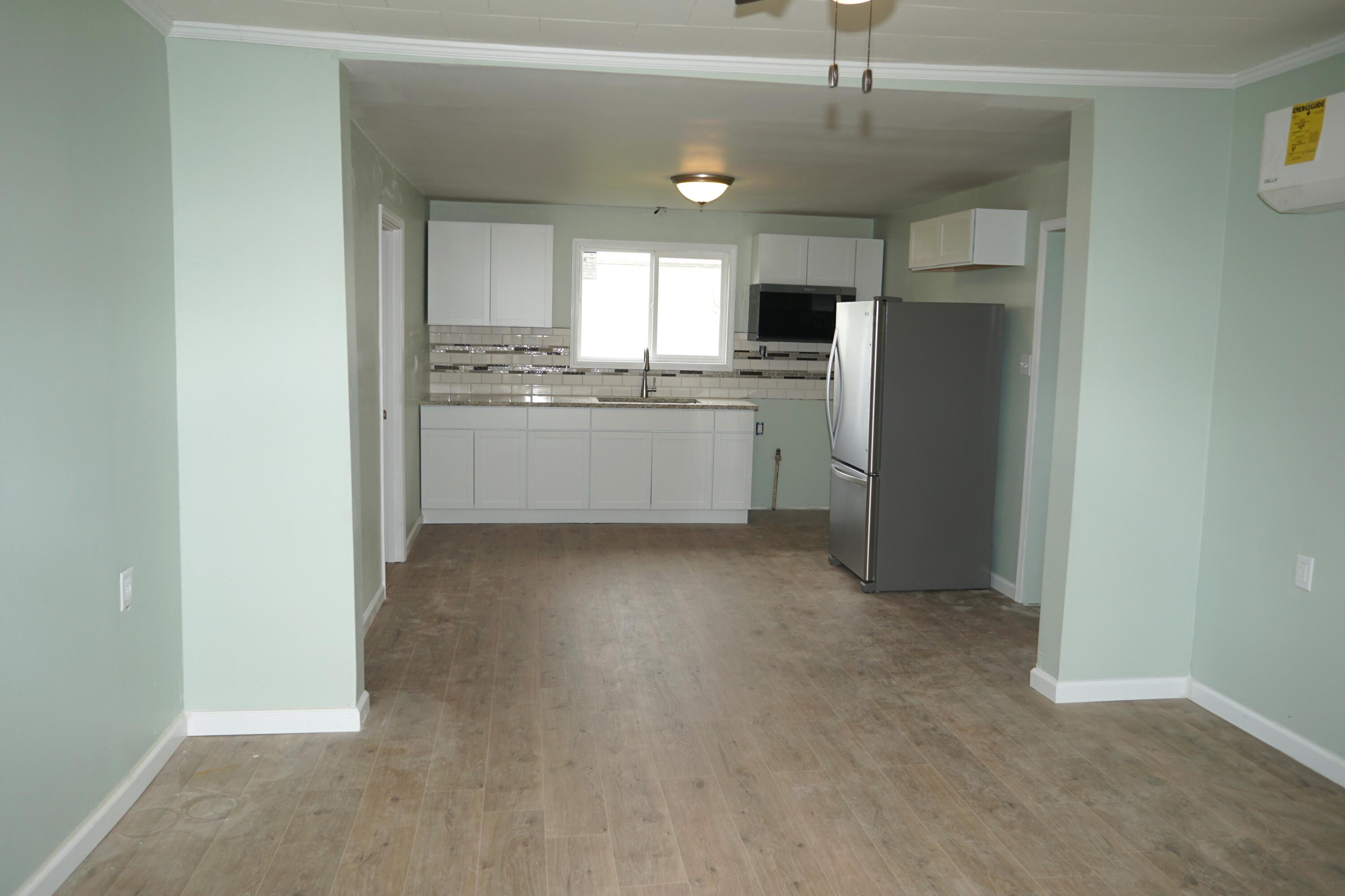 307 South East Street Knox, IN 46534 - Photo 4 of 15 a kitchen with refrigerator and cabinets